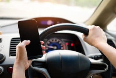 Texting While Driving More Than Health Risks